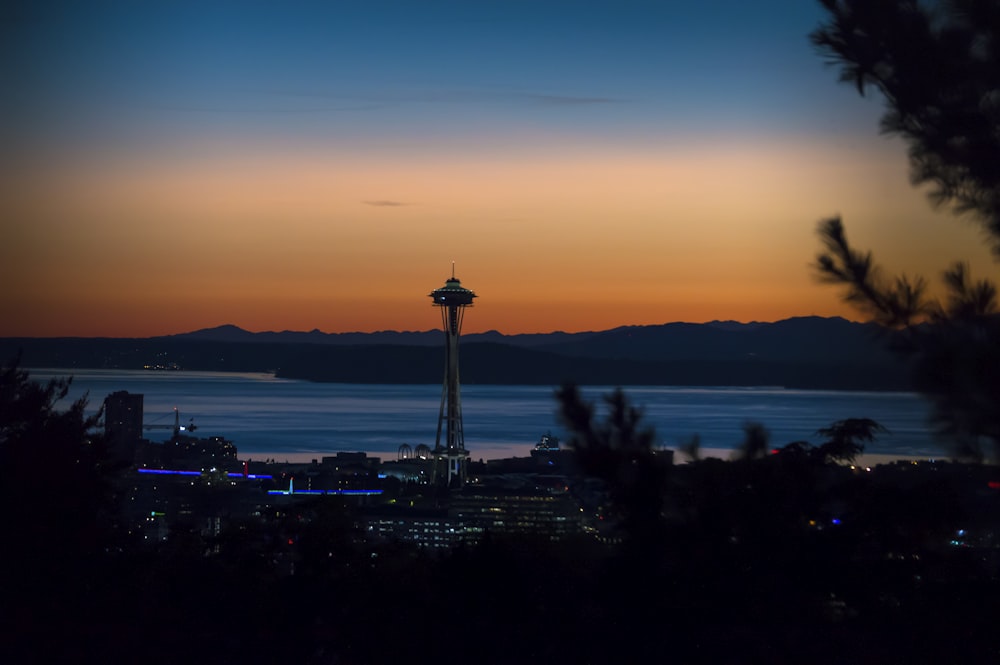 silhouette of tower during sunset