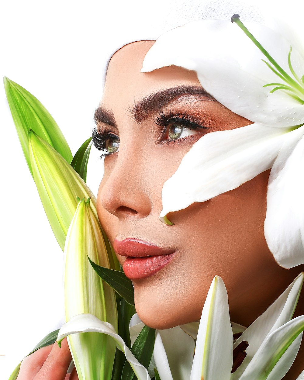 woman with white flower on her face