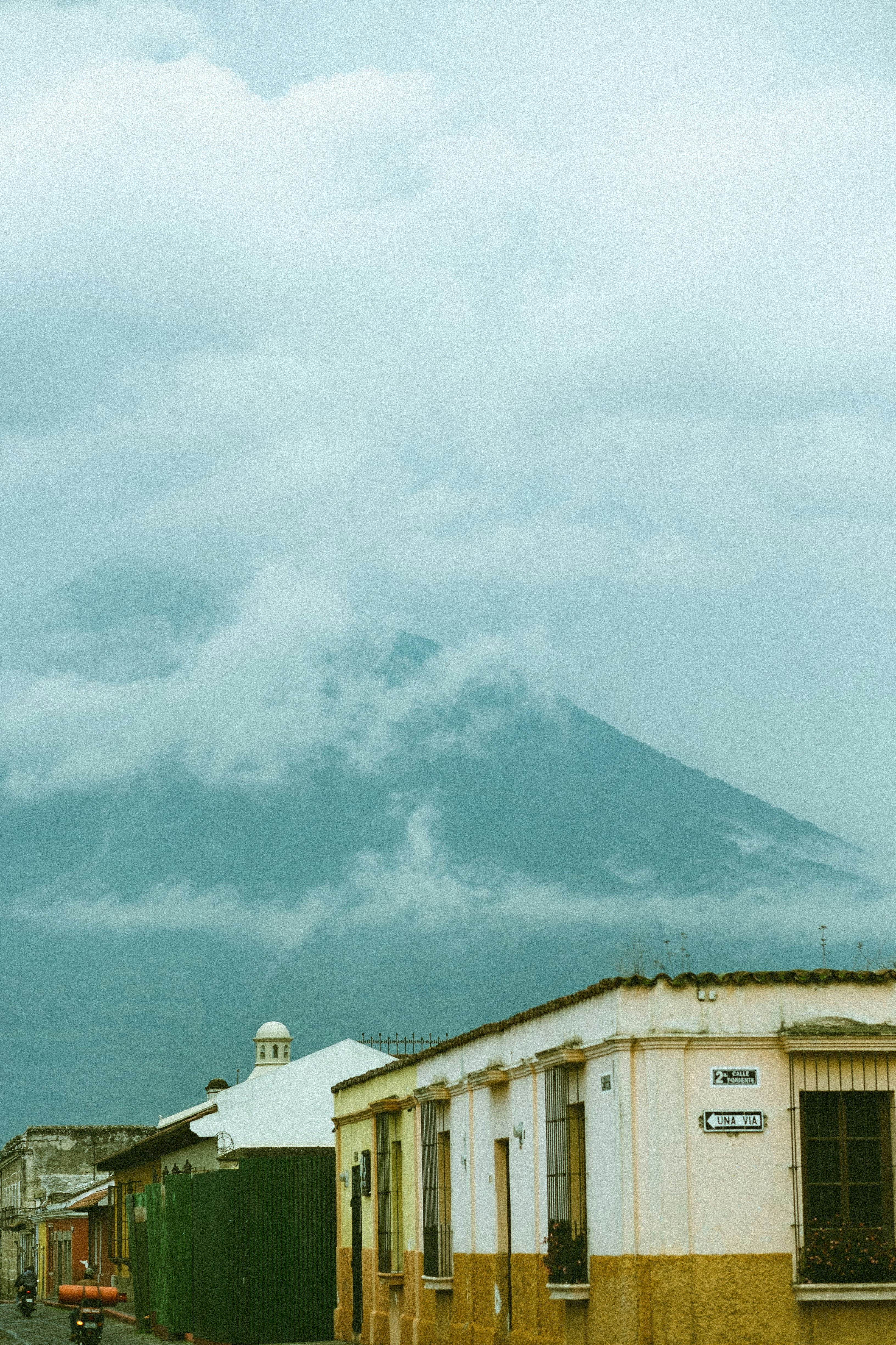 white and black mountain under white clouds during daytime