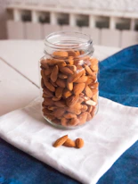 brown beans in clear glass jar