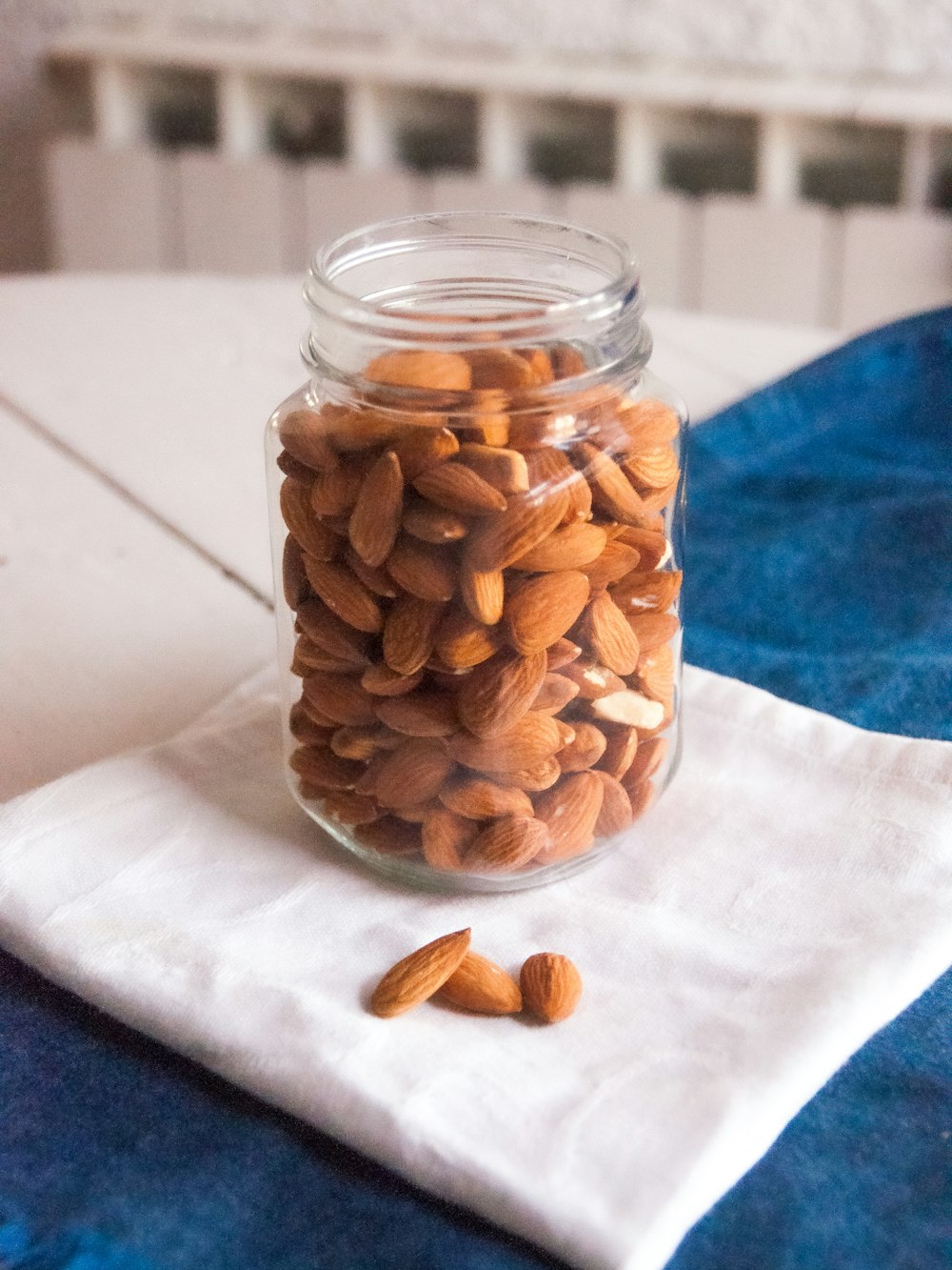 brown beans in clear glass jar