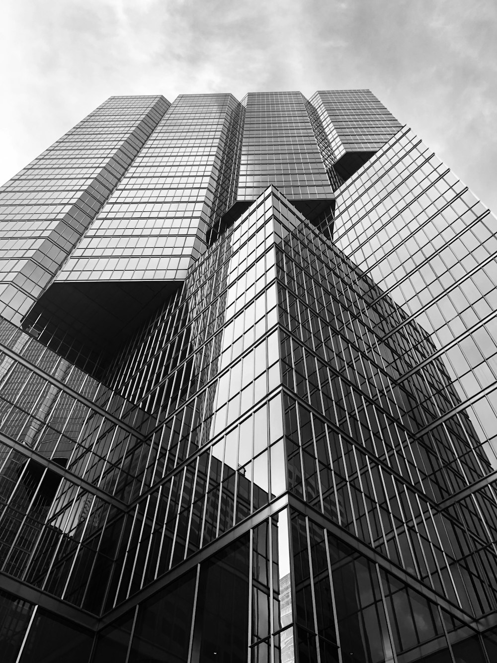 grayscale photo of high rise building