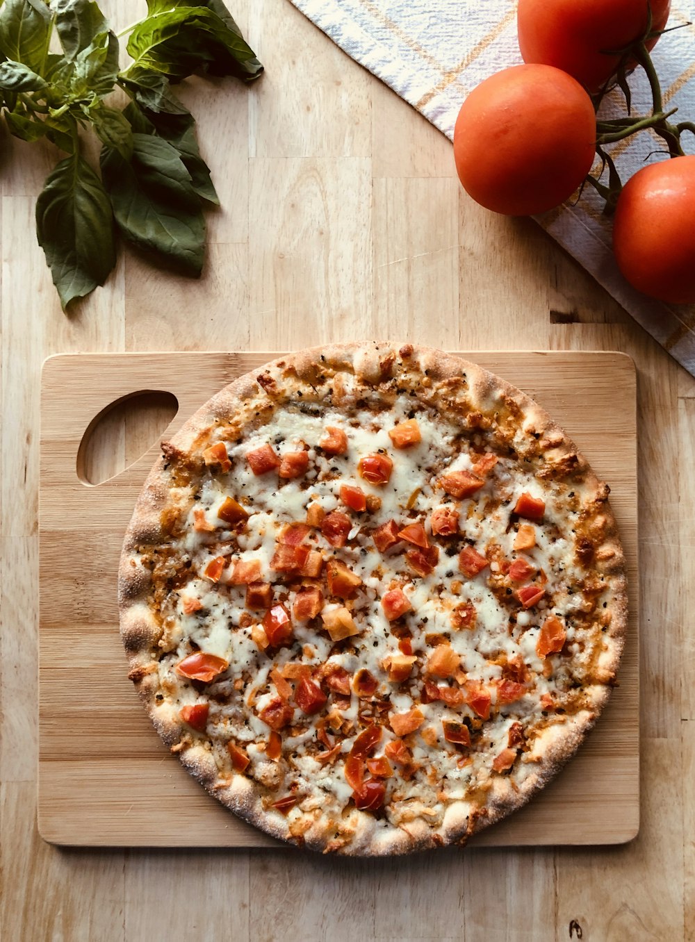 pizza on brown wooden table