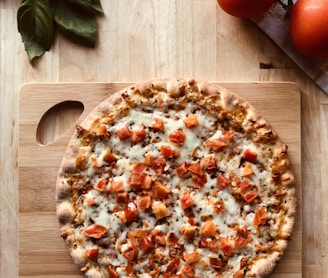 pizza on brown wooden table