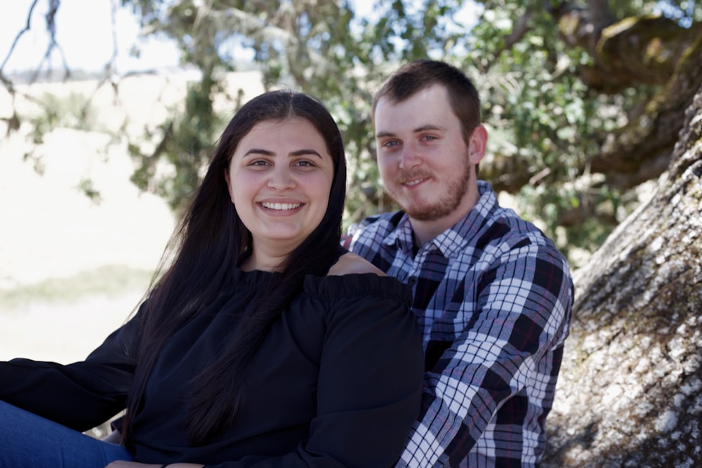 man and woman smiling during daytime