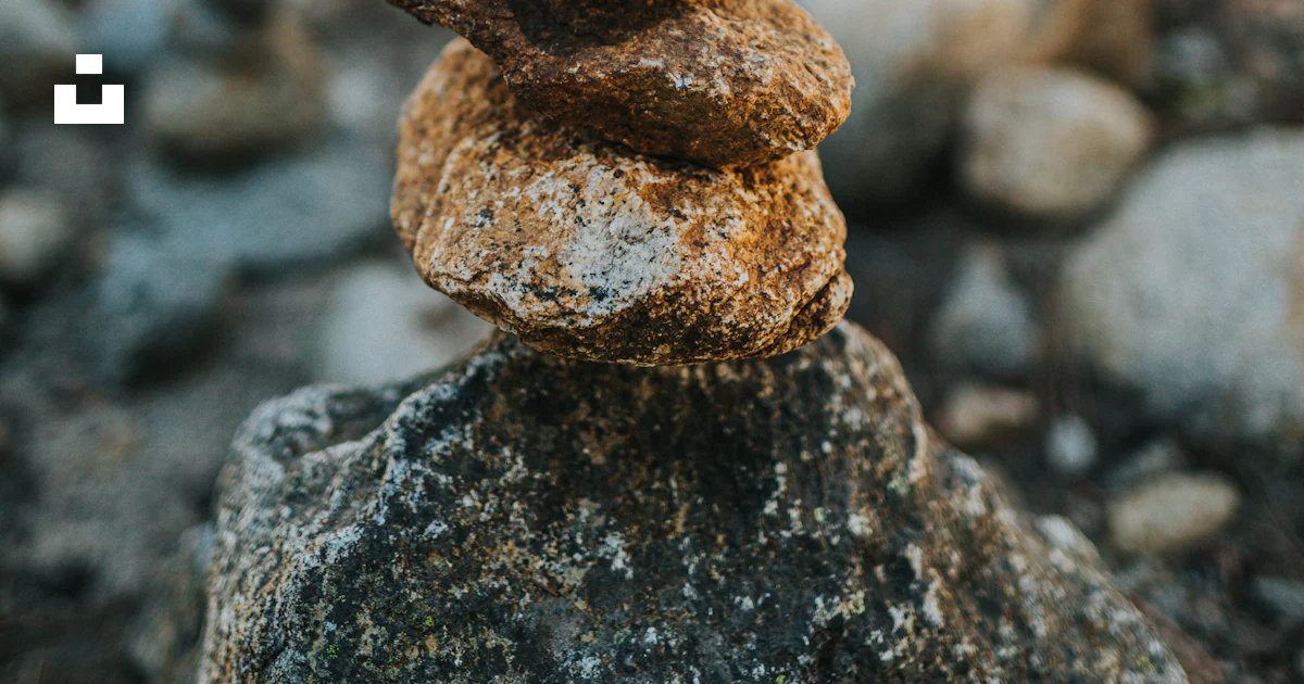 Stack of stones on gray rock photo – Free Brown Image on Unsplash