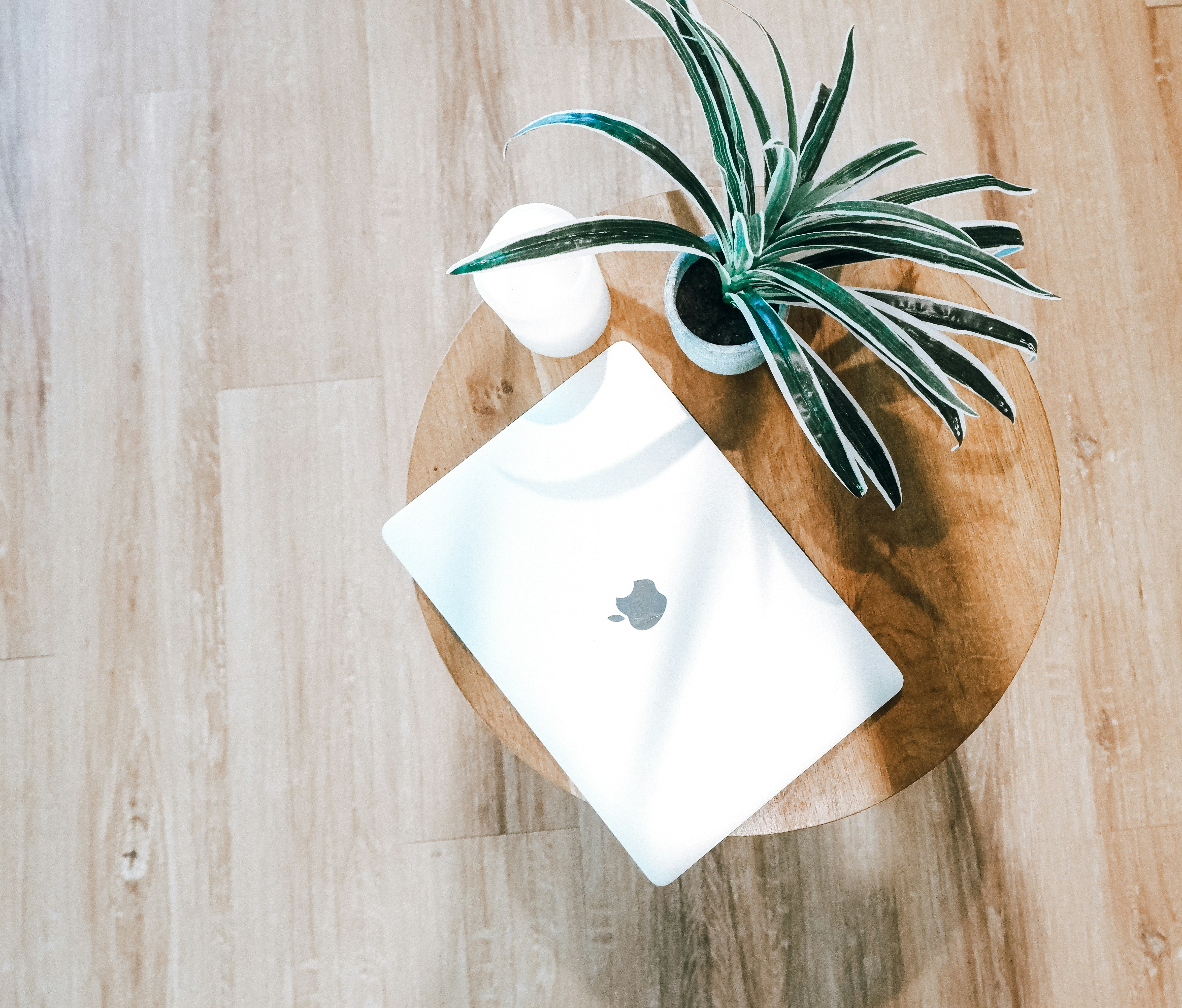 white paper on brown wooden table