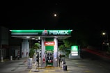 green and white gas station