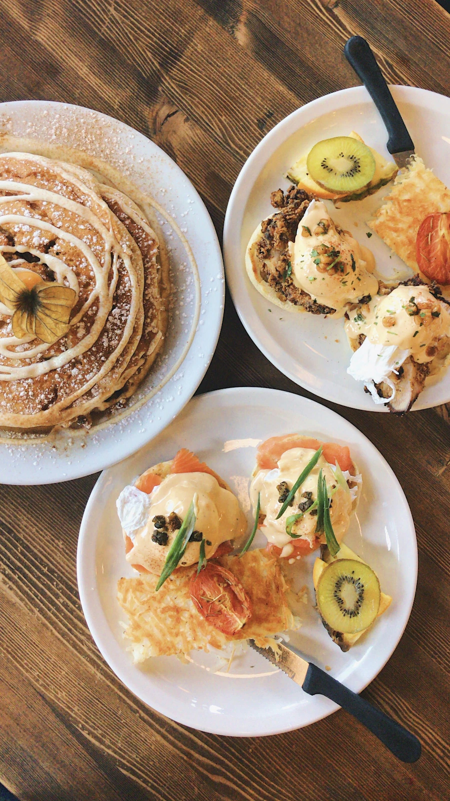 A plated brunch with eggs and fresh sides