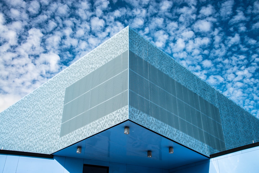 gray concrete building under blue sky during daytime