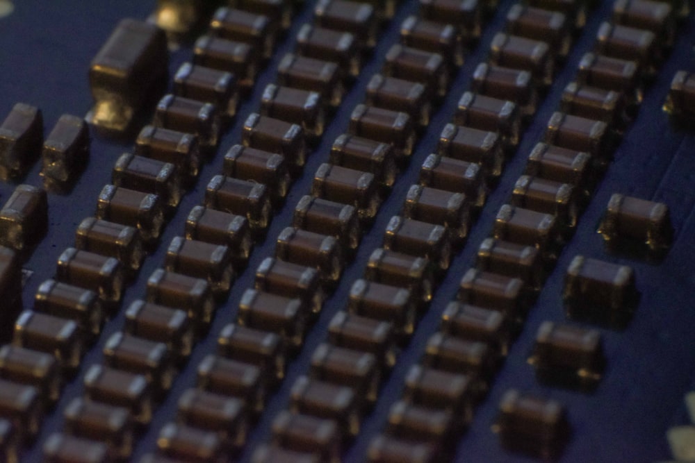 black computer keyboard on brown wooden table