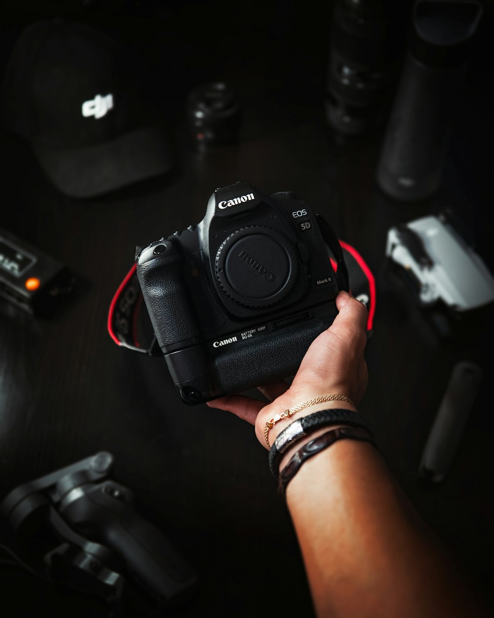 person holding black nikon dslr camera