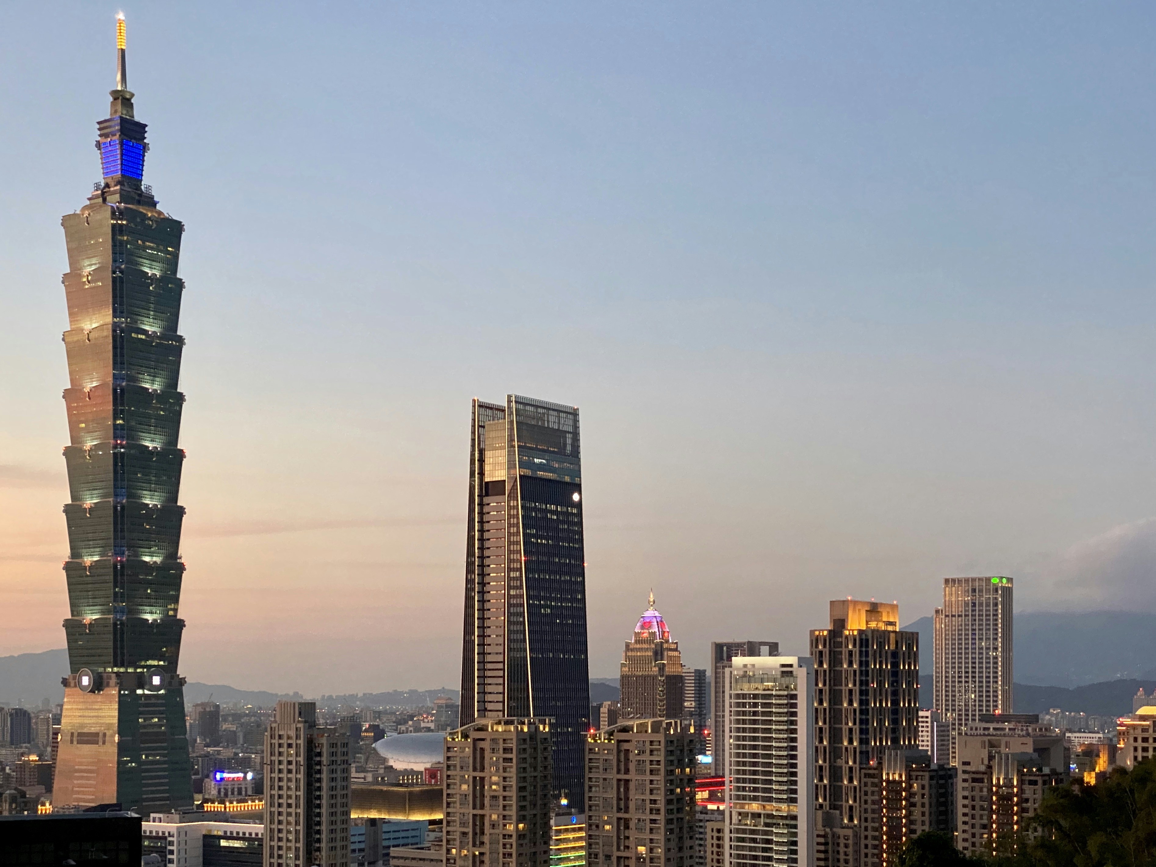 city skyline during night time