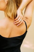 woman in black spaghetti strap top