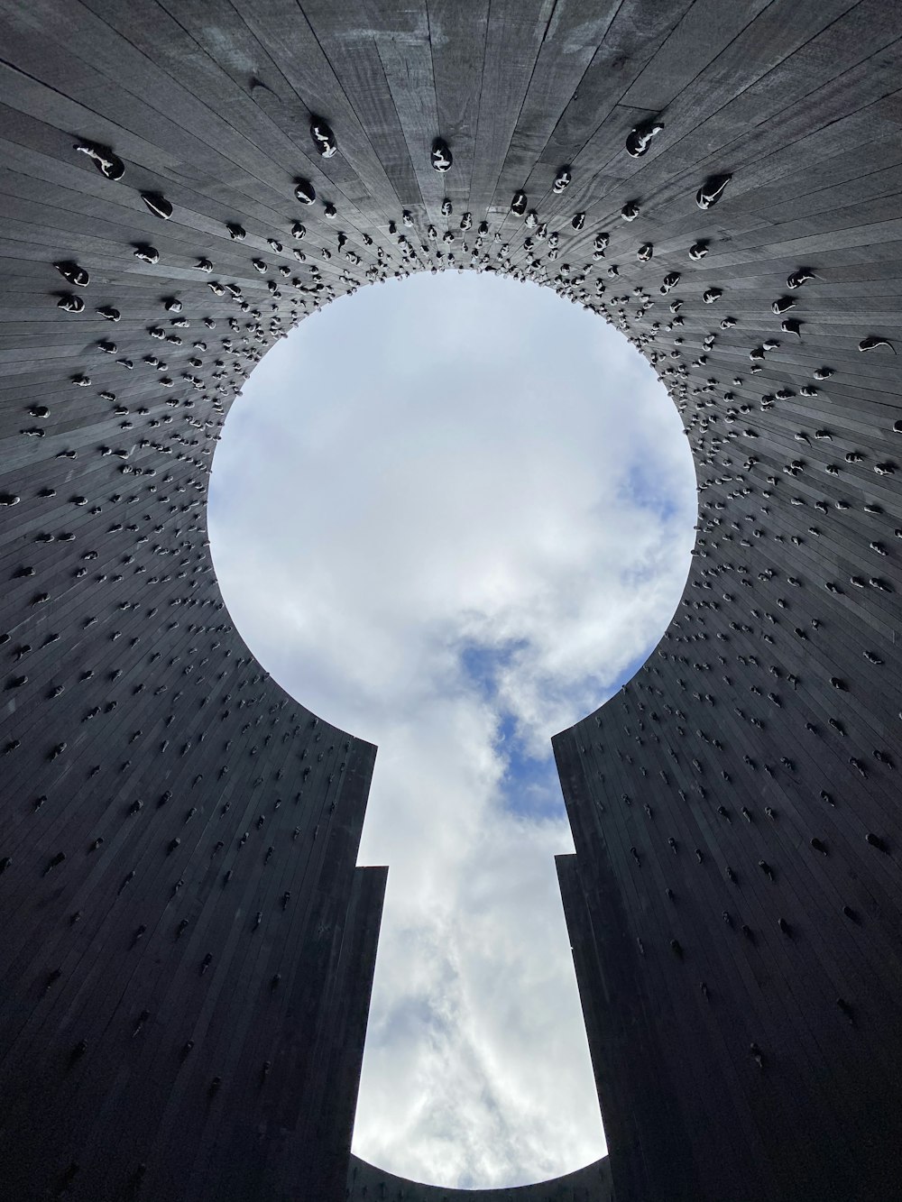 worms eye view of gray concrete building during daytime