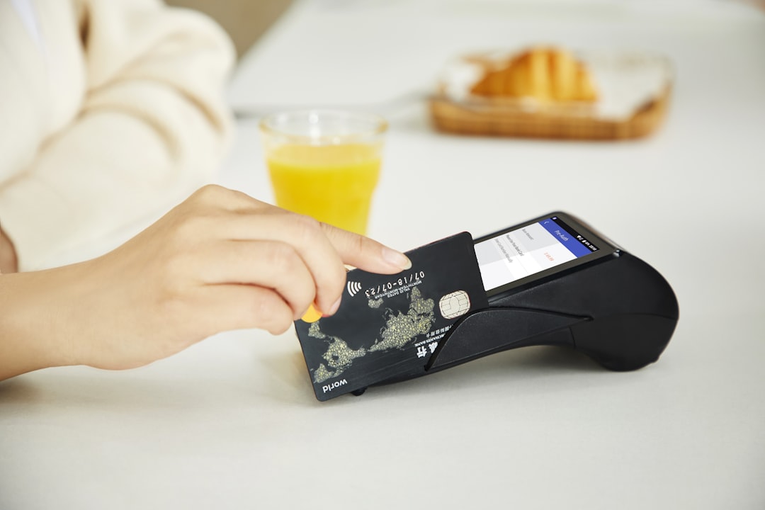 person holding black and white card, PAX Q92 - POS Credit Card Machine - POS machine<p></figure>www.paxtechnology.com
