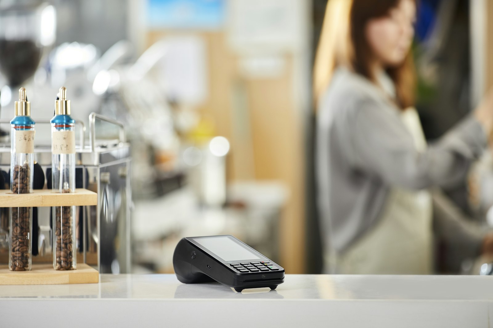 Card payment terminal on a shop counter