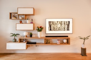 white wooden wall mounted shelf with white wooden frame