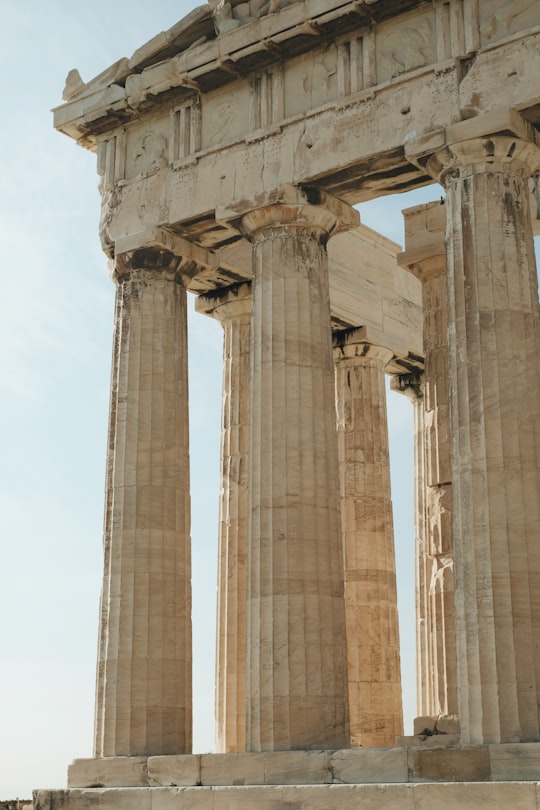 brown concrete building under blue sky during daytime in Parthenon Greece