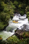 yellow and black boat on river during daytime
