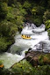yellow and black boat on river during daytime