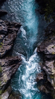 water falls on rocky mountain
