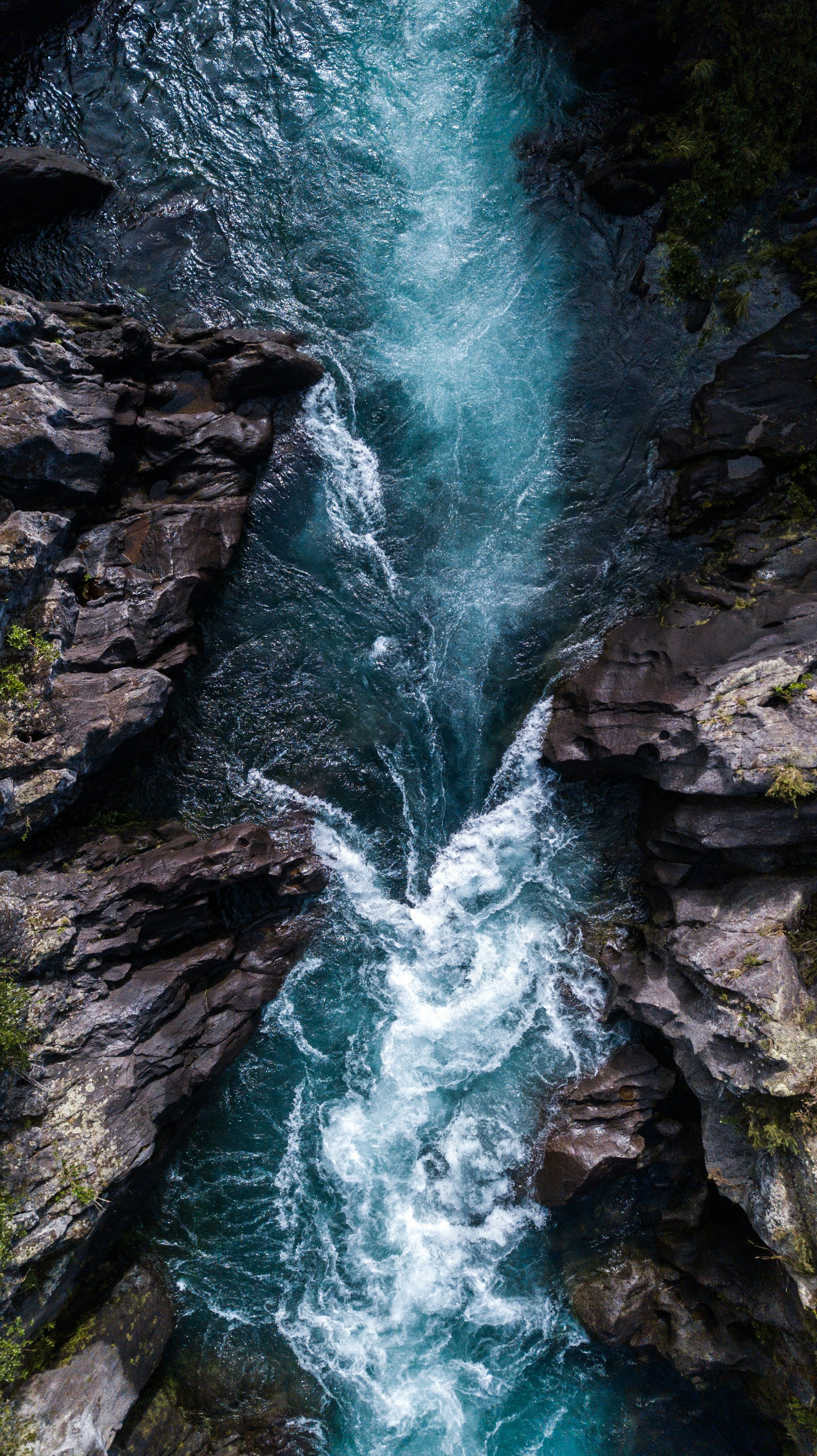 water falls on rocky mountain