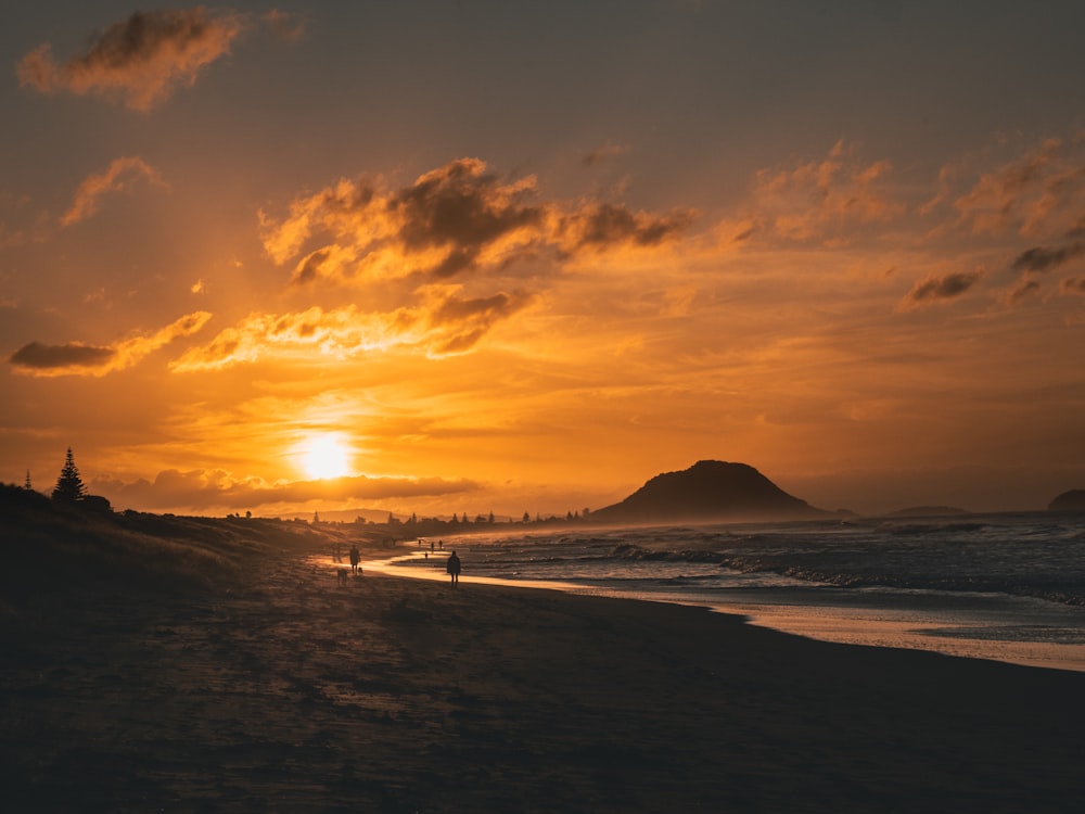 silhouette of mountain during sunset