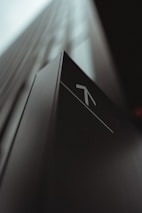 white and black arrow sign
