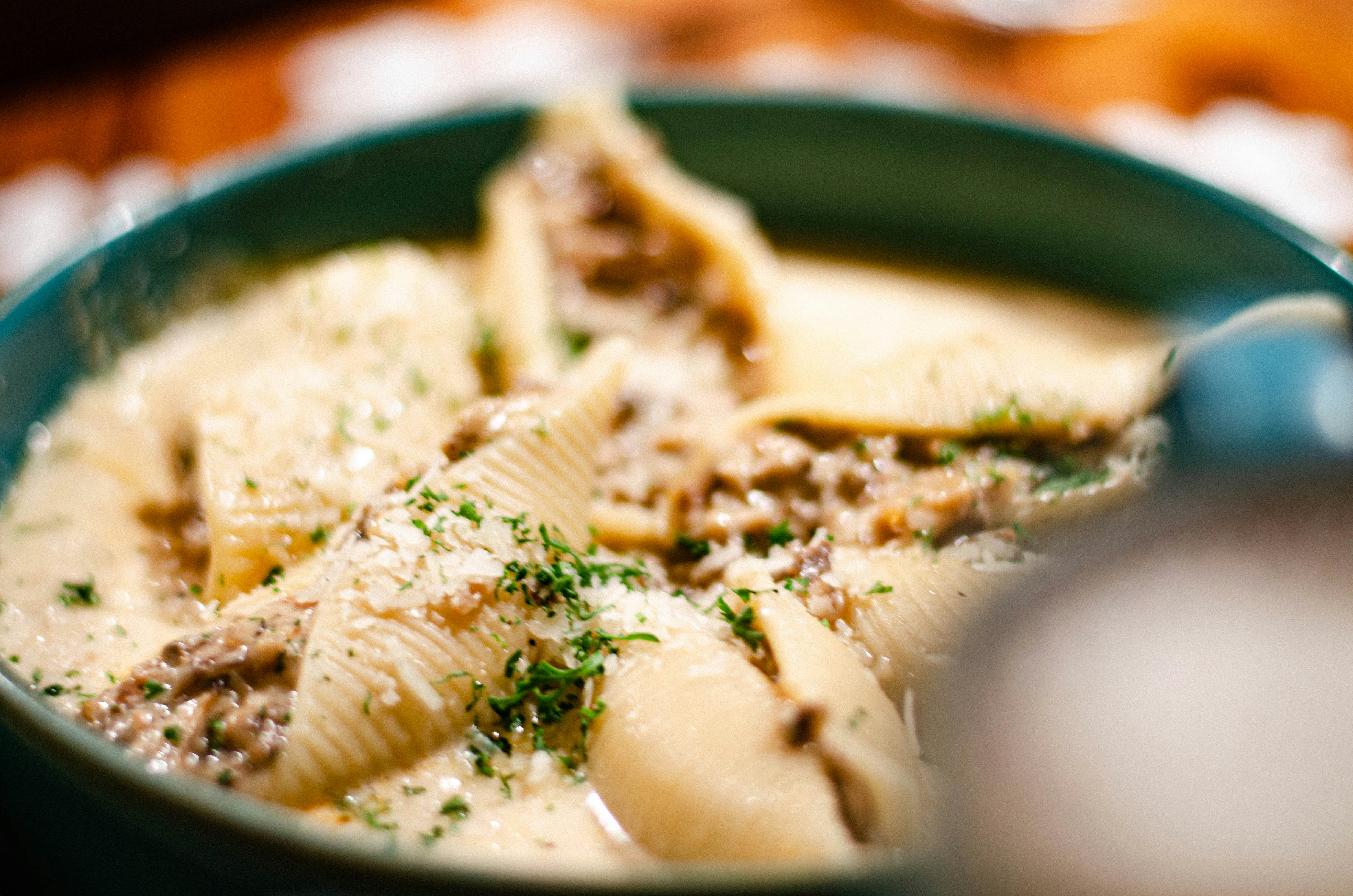 pasta dish on black ceramic plate