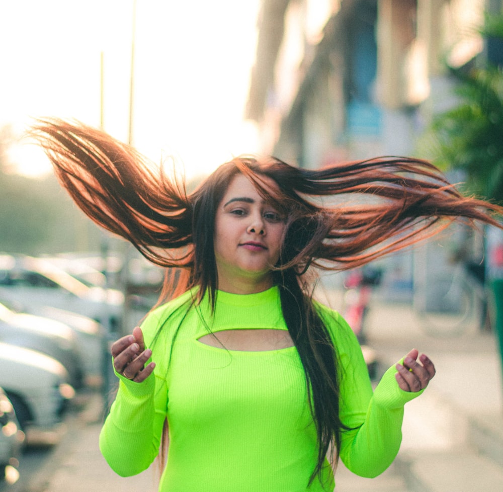 woman in green long sleeve shirt