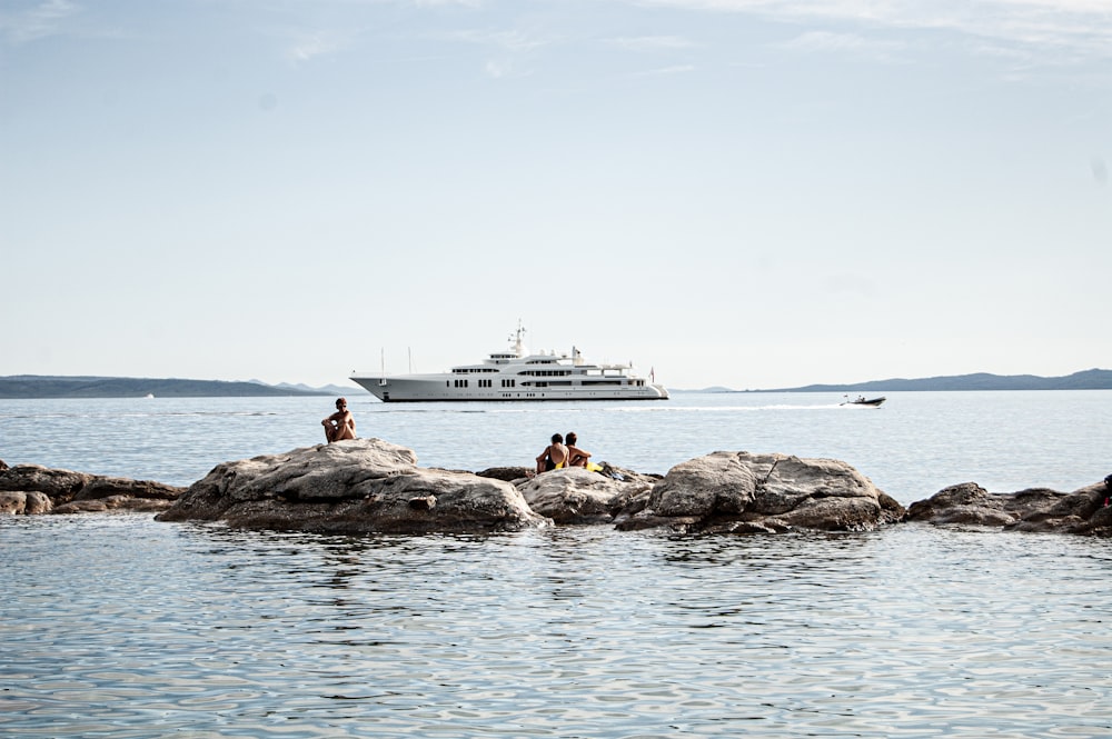 white ship on sea during daytime