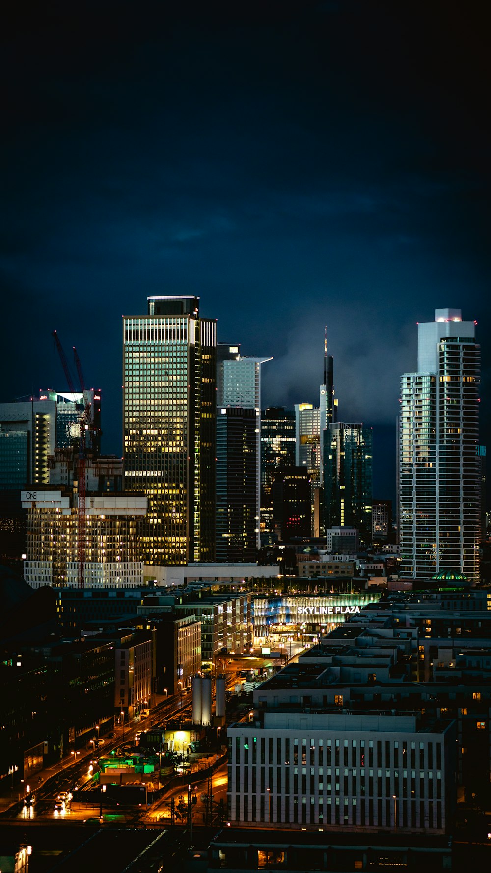 city skyline during night time