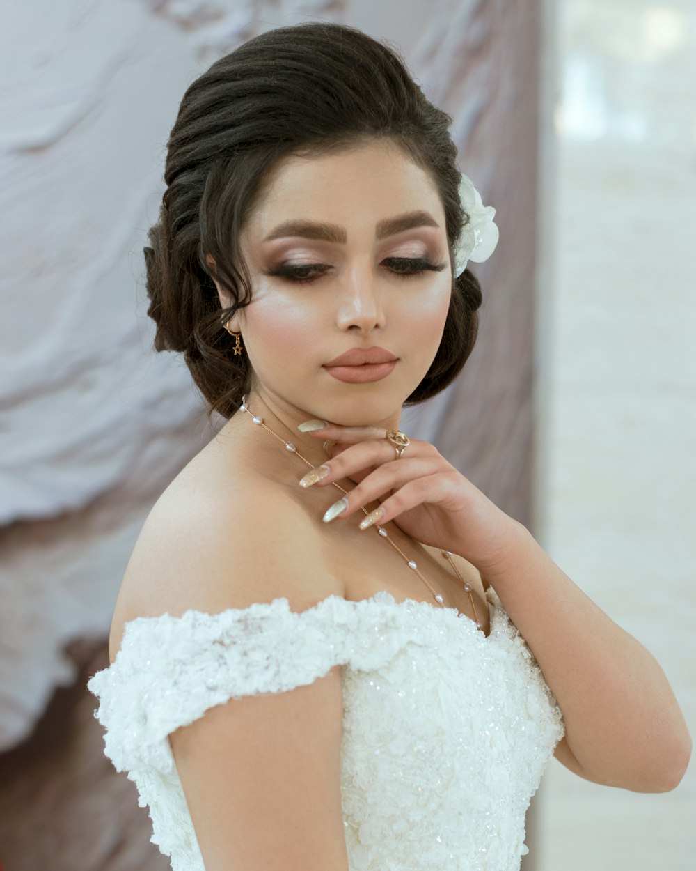 woman in white floral lace dress