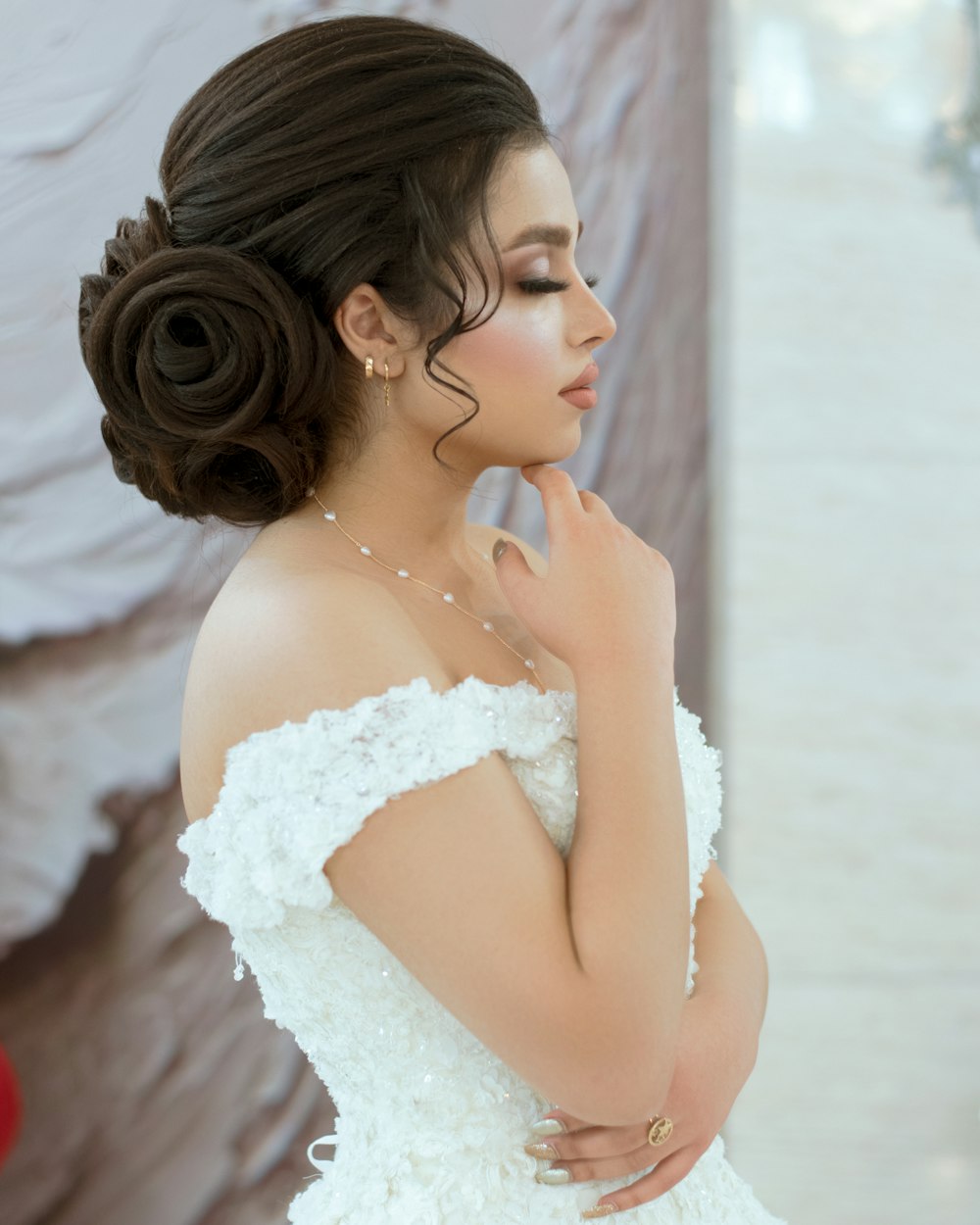 woman in white floral lace dress