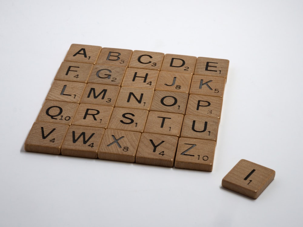 brown wooden blocks on white table