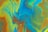 A vibrant abstract design featuring fluid swirls and contours of blue, yellow, and orange hues, creating a dynamic and energetic visual pattern.