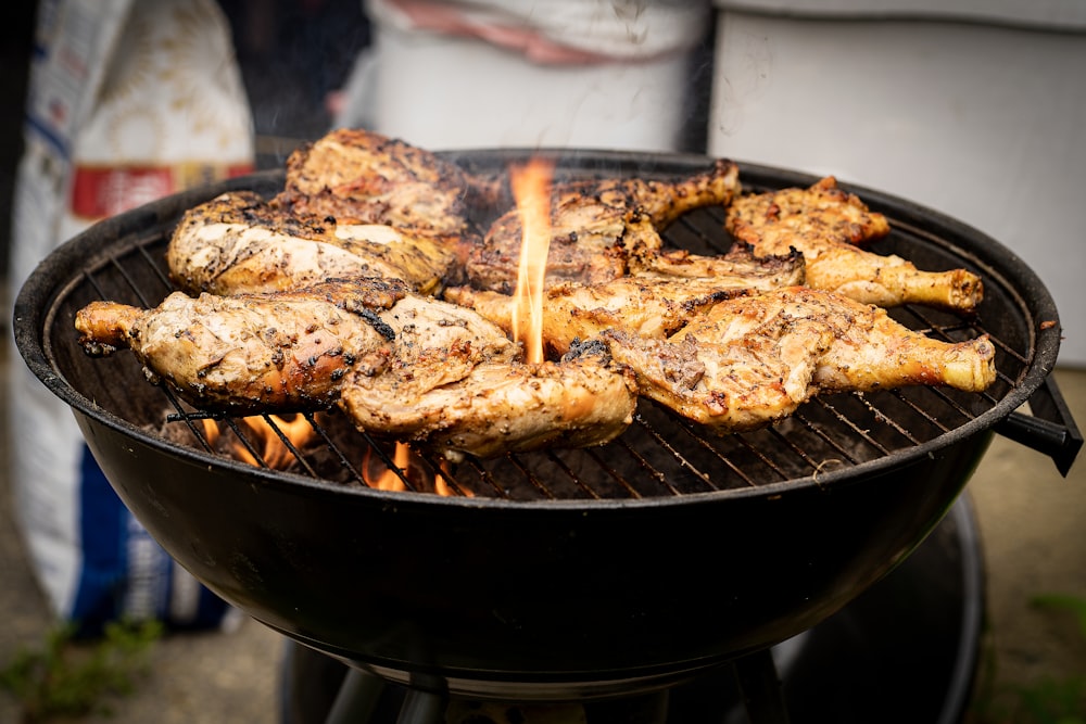 grilled meat on black charcoal grill