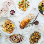 white ceramic plates on table