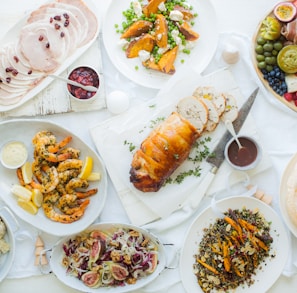 white ceramic plates on table