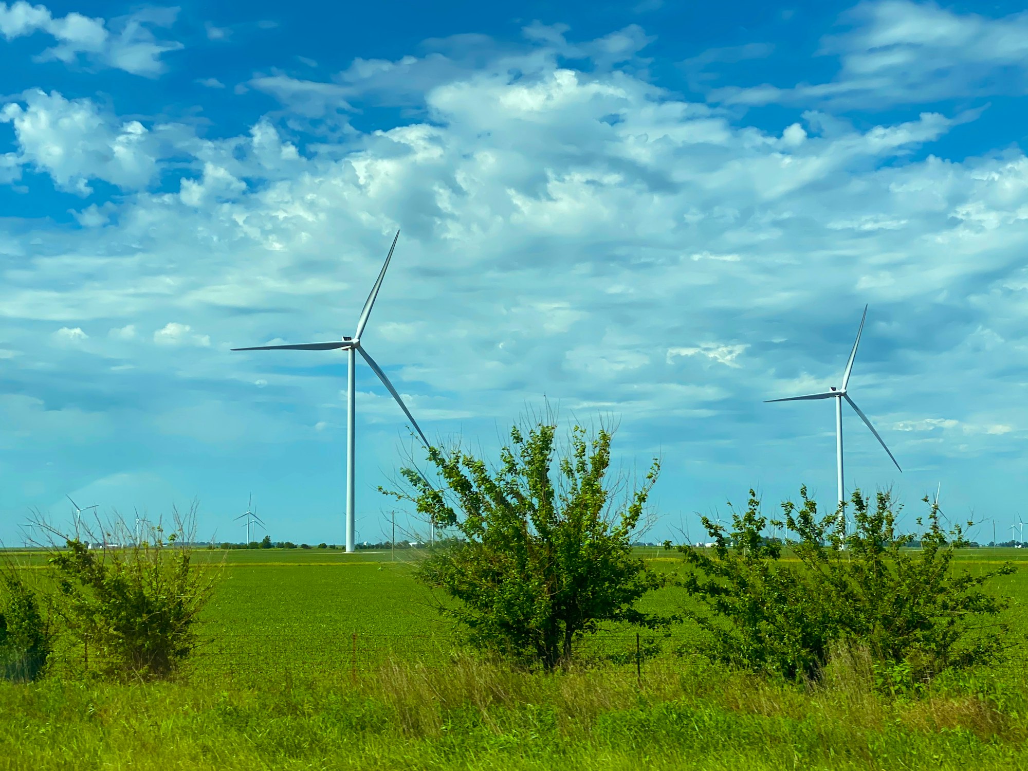 Windmills on the roadside in rural Indiana