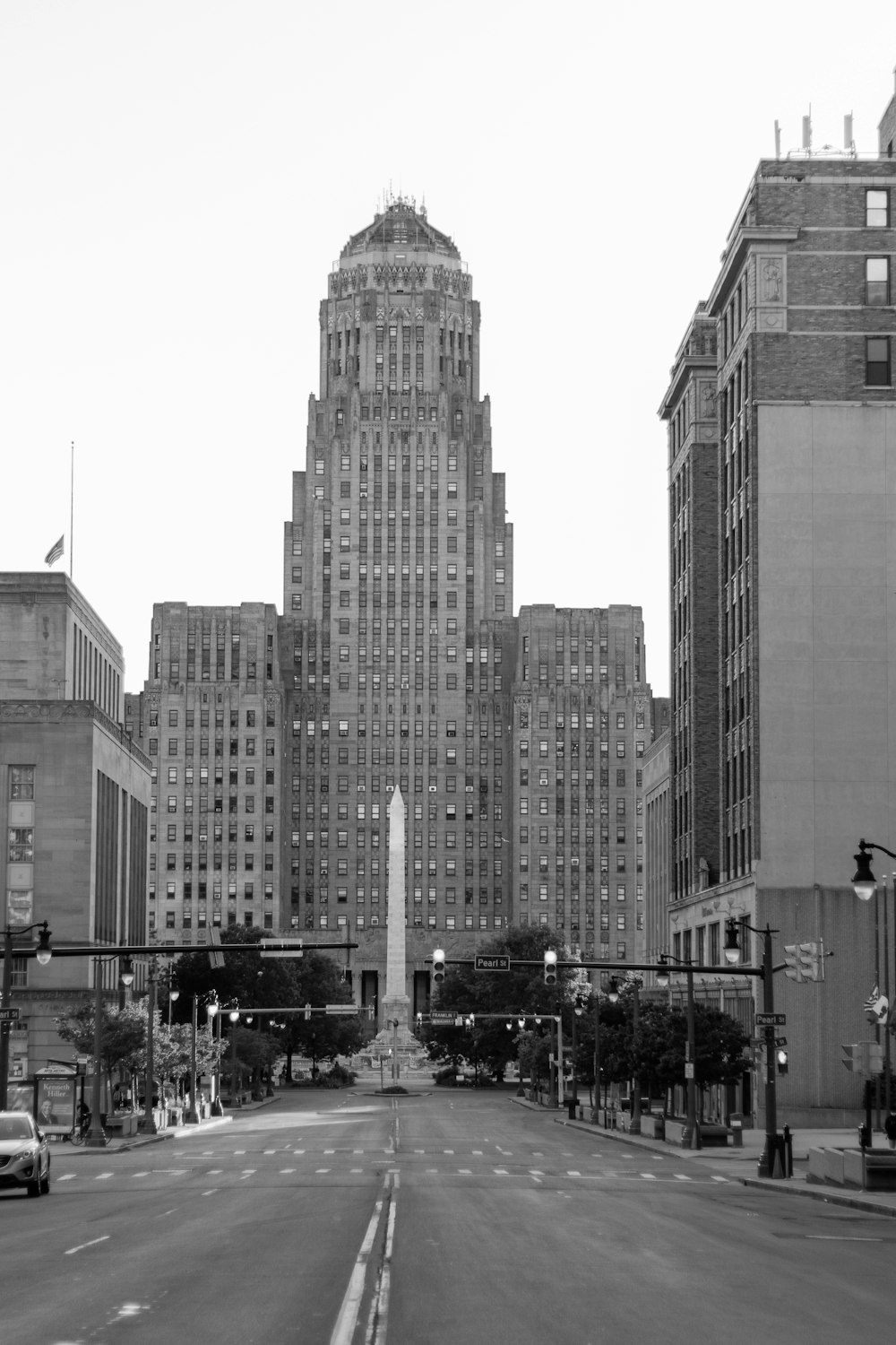 grayscale photo of city buildings