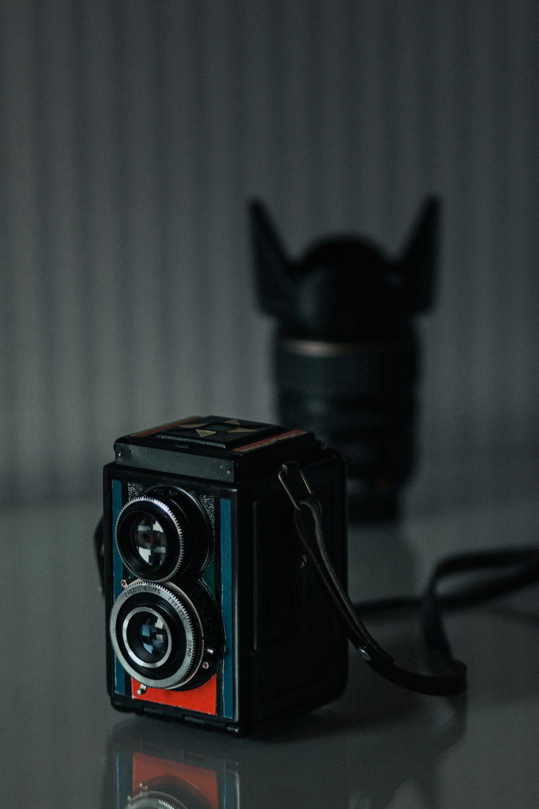 black and silver camera on black tripod