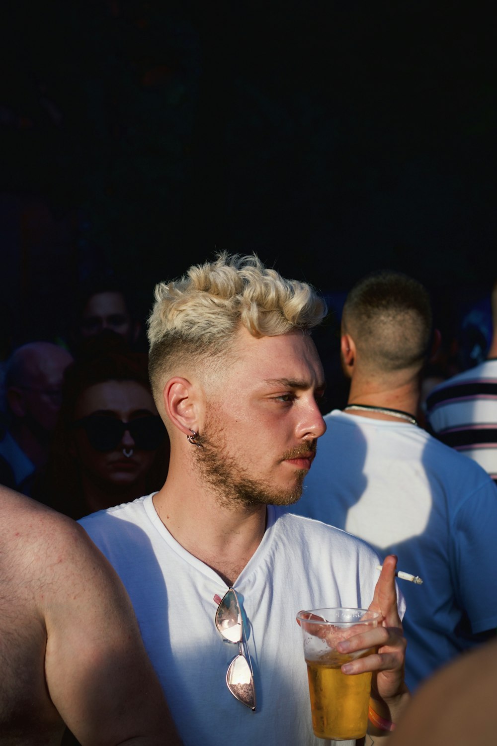 man in white tank top