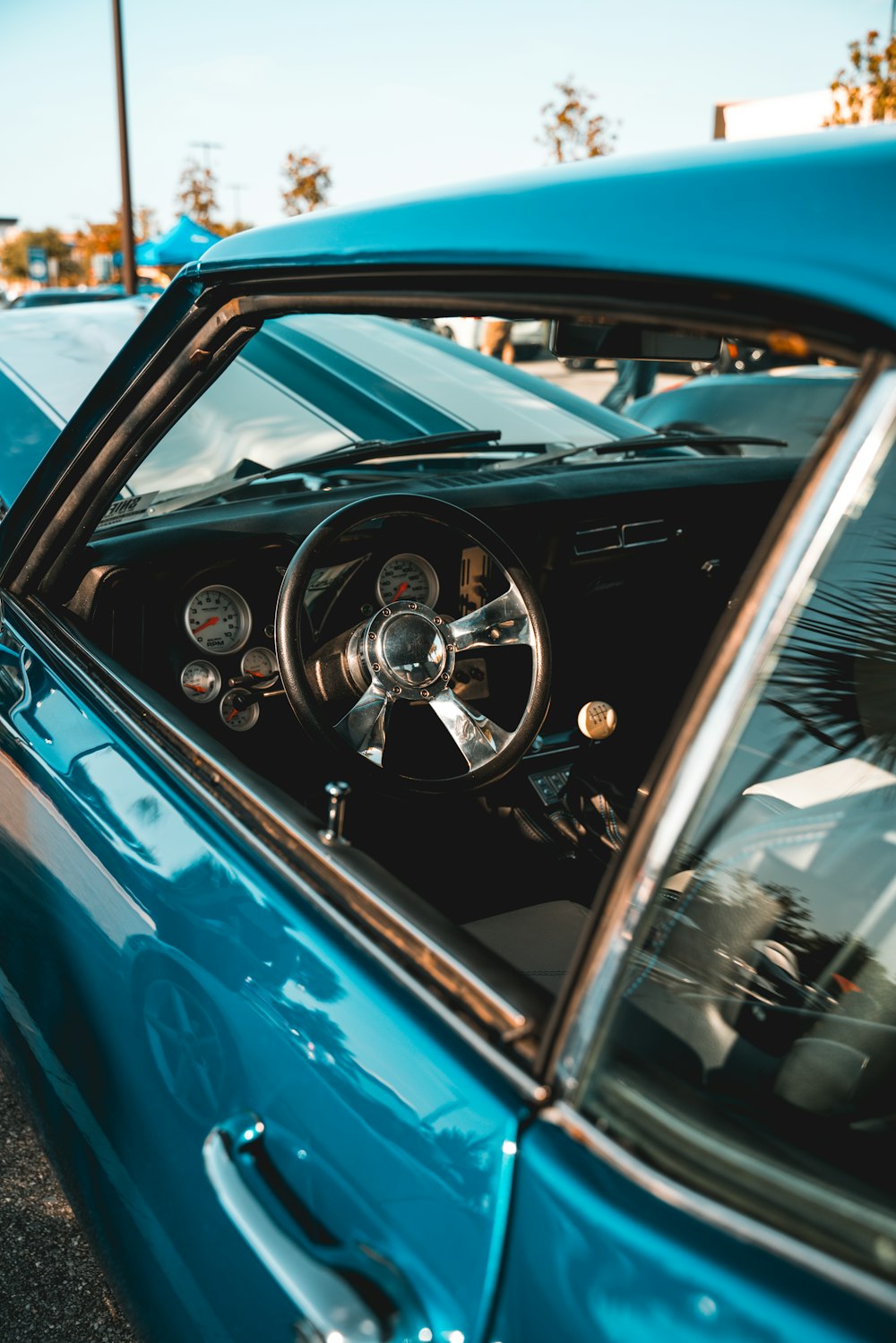 black and silver car steering wheel