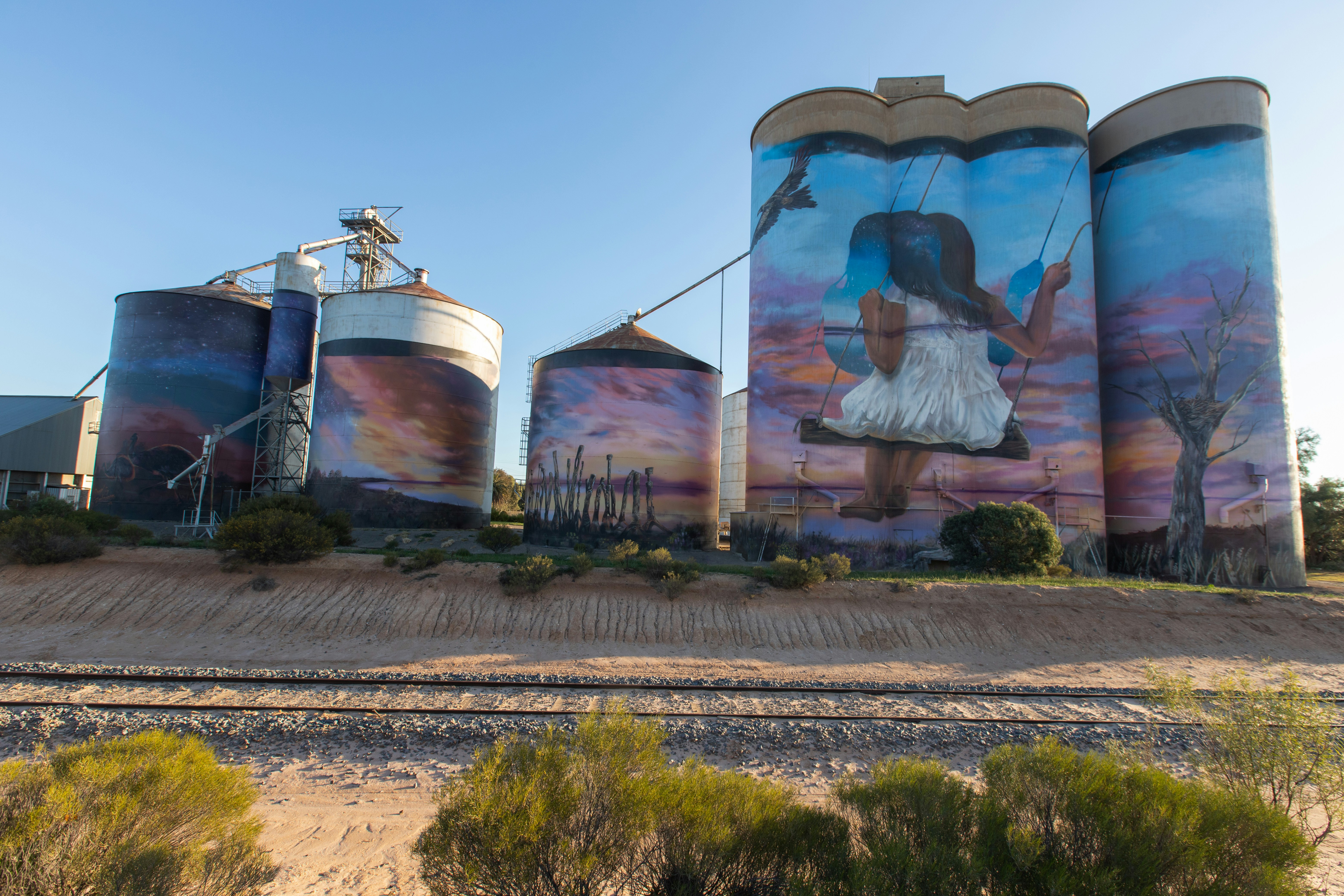 brown and blue horse painting on brown wooden wall