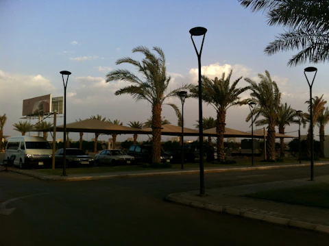 Durable outdoor parking shade systems by Al Naim Fabrication.