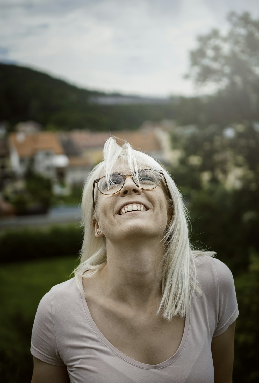 woman in white shirt smiling