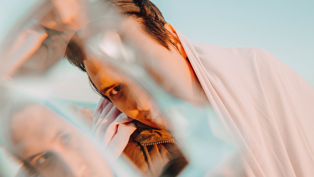 woman in white and brown shirt