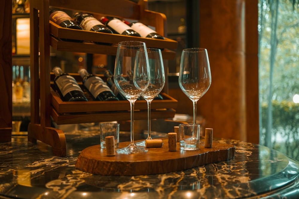 clear wine glass on brown wooden table